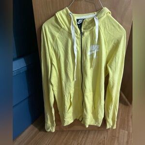 Yellow Nike Zip Up Hoodie. Women’s size SMALL